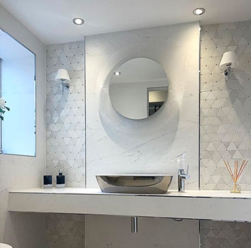 Floating bathroom shelf display with sink and mirror in our Camberley bathroom shop